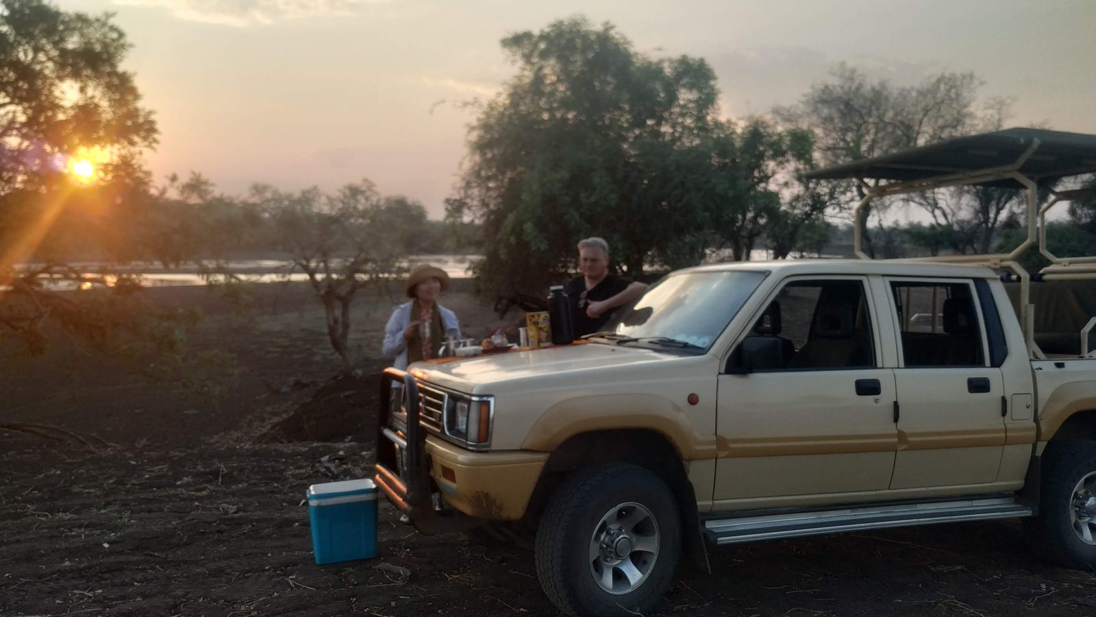 Sundowner on the bonnet of the Zamsato Mitsubishi game viewer – our own safari equipment in Zambia